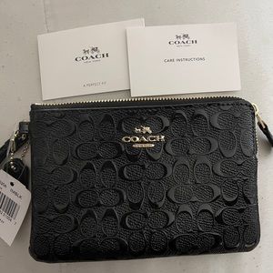 Coach signature wristlet